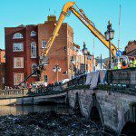 Worcestershire Highways clearing flood debris from Worcester Bridge