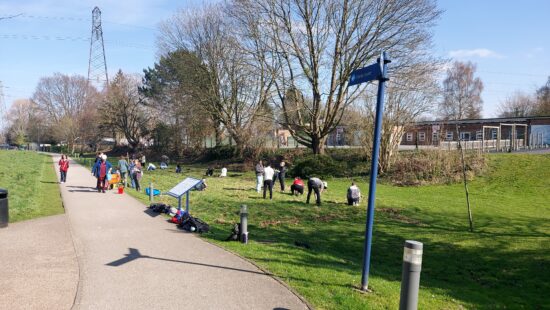 Photos of student and staff volunteers maintaining the Malvern Meadow