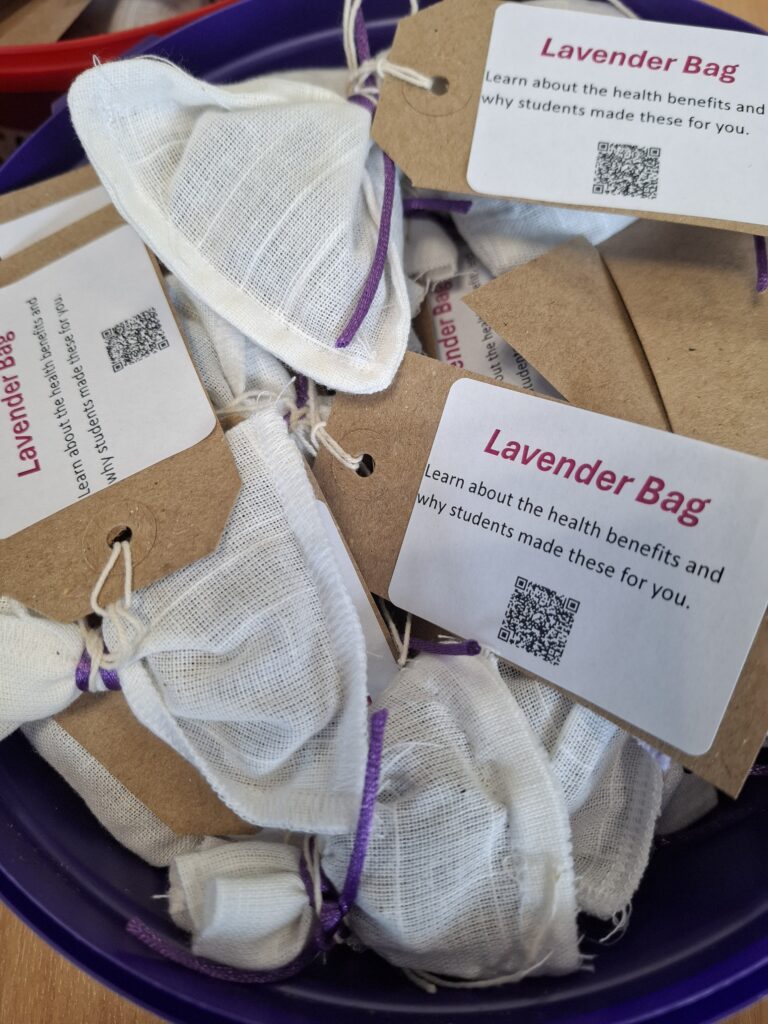 Student volunteer made lavender bags, repurposed natural fabrics, campus-grown lavender